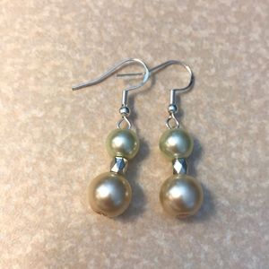 Two toned pearl earrings with silver hooks